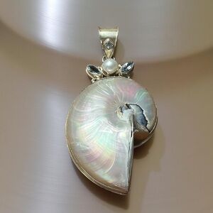This is a Large Pendant 925 sterling silver mother-of-pearl nautilus shell